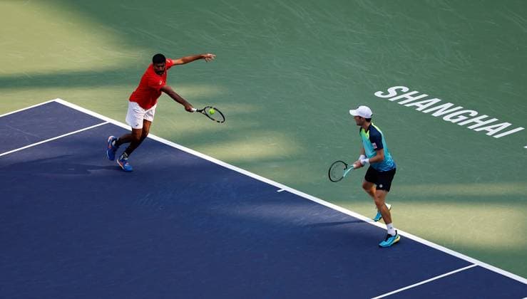 (231015) -- SHANGHAI, Oct. 15, 2023 -- Rohan Bopanna (L) of India Matthew Ebden of Australia compete during the men s doubles final between Marcel Granollers of Spain Horacio Zeballos of Argentina and Rohan Bopanna of India Matthew Ebden of Australia at the ATP, Tennis Herren World Tour Shanghai Masters tennis tournament at Qizhong Forest Sports City Arena in Shanghai, east China, Oct. 15, 2023. ) (SP)CHINA-SHANGHAI-TENNIS-ATP TOUR-SHANGHAI MASTERS(CN) WangxLili 