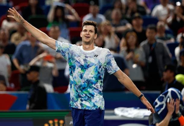 (231015) -- SHANGHAI, Oct. 15, 2023 -- Hubert Hurkacz (L) of Poland celebrates as Andrey Rublev of Russia reacts after the men s singles final at the ATP, Tennis Herren World Tour Shanghai Masters tennis tournament at Qizhong Forest Sports City Arena in Shanghai, east China, Oct. 15, 2023. ) (SP)CHINA-SHANGHAI-TENNIS-ATP TOUR-SHANGHAI MASTERS(CN) WangxLili 