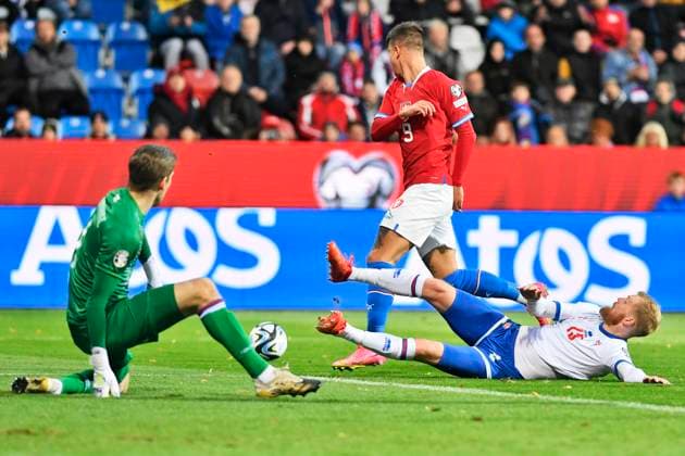 L-R Goalkeeper Mathias Lamhauge (FRO), Adam Hlozek (CZE) and Odmar Faero (FRO) in action during the Group E match of the 2024 European Football Championship qualifiers: Czech Republic - Faroe Islands, Pilsen, Czech Republic, on October 15, 2023. (CTKxPhoto MiroslavxChaloupka) CTKPhotoP2023101505794  CTKPhotoP2023101505794