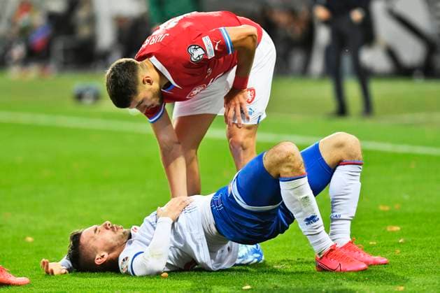 L-R Rene Joensen (FRO) lying down after being hit by the ball and David Jurasek (CZE) in action during the Group E match of the 2024 European Football Championship qualifiers: Czech Republic - Faroe Islands, Pilsen, Czech Republic, on October 15, 2023. (CTKxPhoto MiroslavxChaloupka) CTKPhotoP2023101505835  CTKPhotoP2023101505835