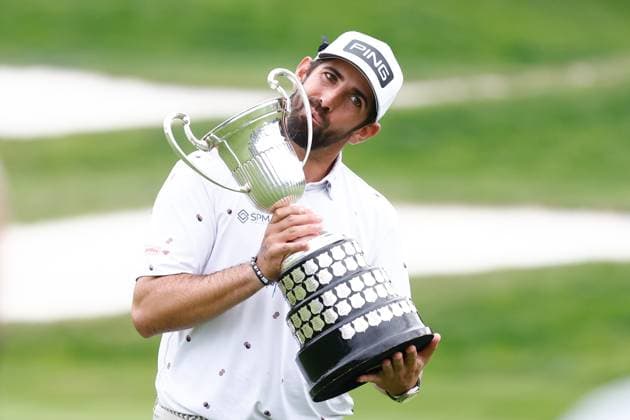 October 15, 2023, MADRID, MADRID, SPAIN: Matthieu Pavon of France poses for photo with the trophy after winning during Acciona Open de Espana, Round 4, Golf tournament celebrated at Club de Campo on October 15, 2023, in Madrid, Spain. MADRID SPAIN - ZUMAa181 20231015_zaa_a181_189 Copyright: xOscarxJ.xBarrosox