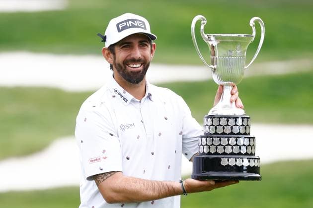 October 15, 2023, MADRID, MADRID, SPAIN: Matthieu Pavon of France poses for photo with the trophy after winning during Acciona Open de Espana, Round 4, Golf tournament celebrated at Club de Campo on October 15, 2023, in Madrid, Spain. MADRID SPAIN - ZUMAa181 20231015_zaa_a181_191 Copyright: xOscarxJ.xBarrosox