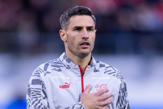 ST GALLEN, SWITZERLAND - OCTOBER 15: Fabian Schar of Switzerland as he lines up for the National Anthems during the UEFA EURO, EM, Europameisterschaft,Fussball 2024 European qualifier match between Switzerland and Belarus at Kybunpark on October 15, 2023 in St Gallen, Switzerland. St Gallen Kybunpark Sankt Gallen Switzerland