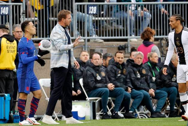 EAST HARTFORD, CT - OCTOBER 14: Germany head coach Julian Nagelsmann directs Germany forward Leroy Sane (19) during a match between the United Sates and Germany on October 14, 2023, at Pratt & Whitney Stadium in East Hartford, Connecticut. (Photo by Fred Kfoury III Icon Sportswire) SOCCER: OCT 14 USA vs Germany EDITORIAL USE ONLY Icon482231014185