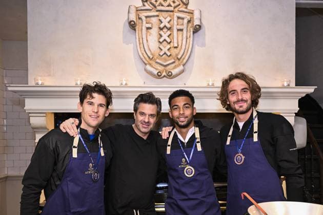 Austrian Dominic Thiem, Sergio Herman, French Arthur Fils and Greek Stefanos Tsitsipas pose for the photographer at the media day of the European Open Tennis ATP, Tennis Herren tournament, at the Frites Atelier of Sergio Herman , in Antwerp, Monday 16 October 2023. LAURIExDIEFFEMBACQ  x77844341x