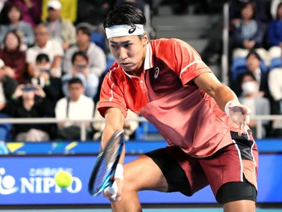 October 17, 2023, Tokyo, Japan - Yosuke Watanuki of Japan returns the ball against Casper Ruud of Norway during the first round match of the Japan Open tennis championships at the Ariake Colosseum in Tokyo on Tuesday, October 17, 2023. (photo by Yoshio Tsunoda AFLO) Noxthirdxpartyxsales  (0308939230st)
