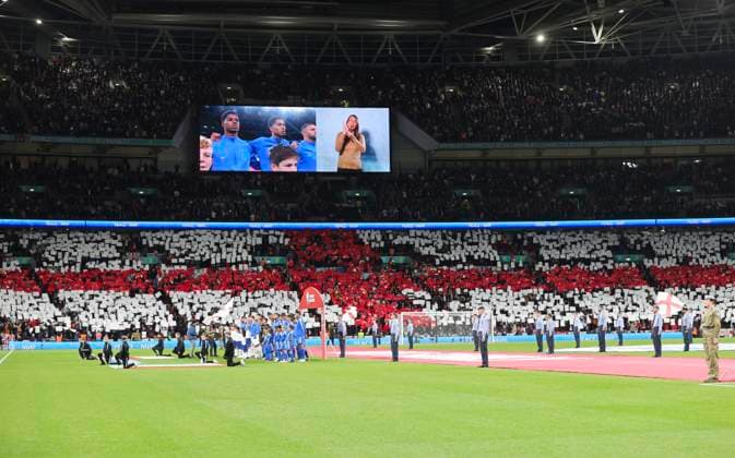 England v Italy UEFA EURO, EM, Europameisterschaft,Fussball 2024 Qualifiers General view of England fans holding up banners for a St George?s Cross during the English National Anthem God Save the King before the UEFA Euro 2024 Qualifiers Group C match at Wembley Stadium, London Copyright: xPaulxChestertonx FIL-19118-0008 UK Newspapers OUT