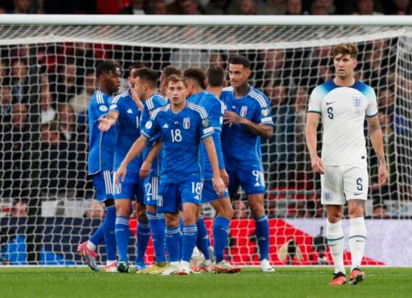 England v Italy UEFA EURO, EM, Europameisterschaft,Fussball 2024 Qualifiers John Stones of England shows dejection as Gianluca Scamacca of Italy (hidden) celebrates with his team-mates after scoring his sides first goal during the UEFA Euro 2024 Qualifiers Group C match at Wembley Stadium, London Copyright: xPaulxChestertonx FIL-19118-0033 UK Newspapers OUT