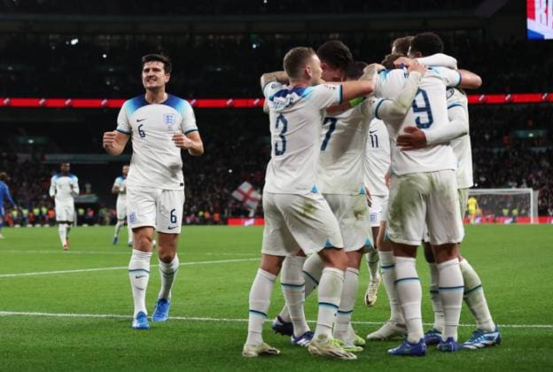 London, England, 17th October 2023. Harry Maguire of England celebrates with fans as Harry Kane of England celebrates with team mates after scoring to make it 3-1 during the UEFA European Championship, EM, Europameisterschaft Qualifying match at Wembley Stadium, London. Picture credit should read: David Klein Sportimage EDITORIAL USE ONLY. No use with unauthorised audio, video, data, fixture lists, club league logos or live services. Online in-match use limited to 120 images, no video emulation. No use in betting, games or single club league player publications. SPI-2649-0122