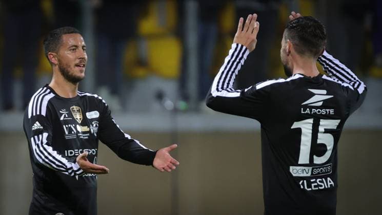 Belgium s Eden Hazard and VCL s Yohan Cabaye celebrate after scoring during a gala soccer game between Variety Club France with various personnalities and a team of Calais, for Les Pieces Jaunes association, Wednesday 18 October 2023, in Calais, France. Belgian Hazard announced last week his retirement. VIRGINIExLEFOUR  x77994322x