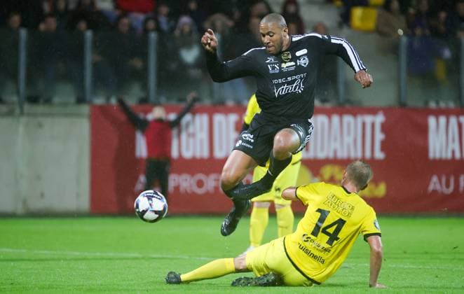 VCL s Ciryl Gane fights for the ball during a gala soccer game between Variety Club France with various personnalities and a team of Calais, for Les Pieces Jaunes association, Wednesday 18 October 2023, in Calais, France. Belgian Hazard announced last week his retirement. VIRGINIExLEFOUR  x77997986x
