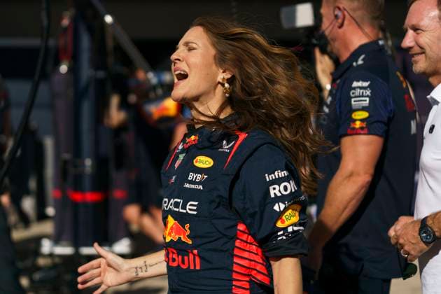 Actress Drew Barrymore reacts to the crowd in pit lane during the Formula One Grand Prix of the US at the Circuit of The Americas in Austin, Texas, on Thursday, October 19, 2023.  AUS20231019703 GREGxNASH