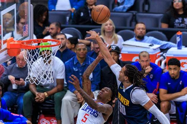 Sport Themen der Woche KW42 Sport Bilder des Tages October 19, 2023, Los Angeles, California, USA: Bones Hyland 5 of the Los Angeles Clippers attempts to score as Aaron Gordon 50 of the Denver Nuggets blocks during their preseason NBA, Basketball Herren, USA game on Thursday October 19, 2023 at Crypto.com Arena in Los Angeles, California. Clippers lose to Nuggets, 90-103. ARIANA RUIZ PI Los Angeles USA - ZUMAp124 20231019_zaa_p124_026 Copyright: xArianaxRuizx