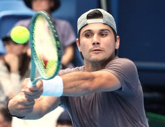 October 20, 2023, Tokyo, Japan - Marcos Giron of the United States returns the ball against Felix Auger-Aliassime of Canada during the quater final match of the Japan Open tennis championships at the Ariake Colosseum in Tokyo on Friday, October 20, 2023. (photo by Yoshio Tsunoda AFLO) Noxthirdxpartyxsales  (233036337)