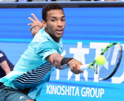 October 20, 2023, Tokyo, Japan - Felix Auger-Aliassime of Canada returns the ball against Marcos Giron of the United States during the quater final match of the Japan Open tennis championships at the Ariake Colosseum in Tokyo on Friday, October 20, 2023. (photo by Yoshio Tsunoda AFLO) Noxthirdxpartyxsales  (233036374)
