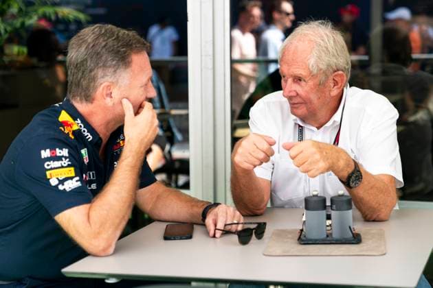 Red Bull Racing team chief Christian Horner speaks with Red Bull consultant Helmut Marko in the paddock during the Formula One Grand Prix of the United States at the Circuit of The Americas in Austin, Texas, on Saturday, October 21, 2023.  AUS20231021122 GREGxNASH