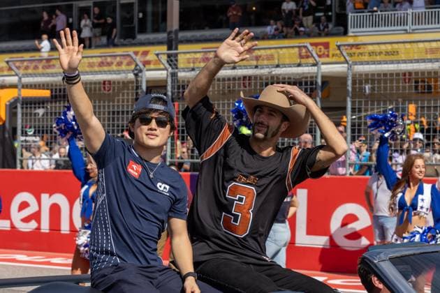 AUSTIN, TX - OCTOBER 22: Scuderia AlphaTauri driver Daniel Ricciardo (3) of Australia and Scuderia AlphaTauri driver Yuki Tsunonda (22) of Japan during the driver parade before the Formula 1 Lenovo United States Grand Prix on October 22, 2023, at Circuit of The Americas in Austin, Texas. (Photo by David Buono Icon Sportswire) AUTO: OCT 22 F1 United States Grand Prix EDITORIAL USE ONLY Icon2310220621