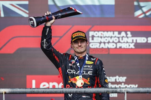 VERSTAPPEN Max (ned), Red Bull Racing RB19, portrait podium during the 2023 Formula 1 Lenovo United States Grand Prix, 18th round of the 2023 Formula One World Championship, WM, Weltmeisterschaft from October 20 to 22, 2023 on the Circuit of The Americas, in Austin, USA - F1 - US GRAND PRIX 2023 - RACE DPPI Panoramic  00123041__R3_4175