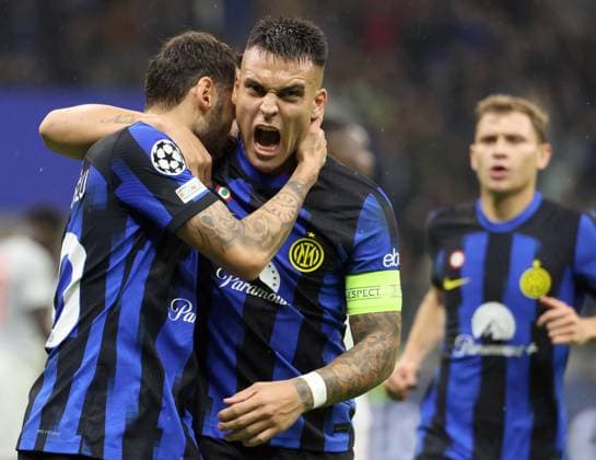 October 24, 2023, MILAN, ITALY: Inter Milan™s Hakan Calhanoglu (L) jubilates with his teammate Lautaro Martinez after scoring goal of 2 to 1 during he UEFA Champions League group D soccer match between Fc Inter and Fc Salzburg at Giuseppe Meazza stadium in Milan, 24 October 2023..ANSA MATTEO BAZZI. Soccer; Champions League: Fc Inter vs Fc Salzburg  - ZUMAa110 20231024_zaf_a110_081 Copyright: xMatteoxBazzix