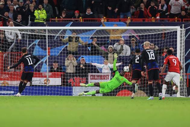 Football - UEFA Champions League - Group A - Manchester United, ManU v FC Copenhagen 24th October 2023 - UEFA Champions League - Group A - Manchester United v FC Copenhagen - Manchester United goalkeeper Andre Onana saves a last minute penalty from Jordan Larsson of FC Copenhagen to ensure a United win - Photo: Simon Stacpoole Offside. Manchester UK Copyright: xSimonxStacpoolexOffside