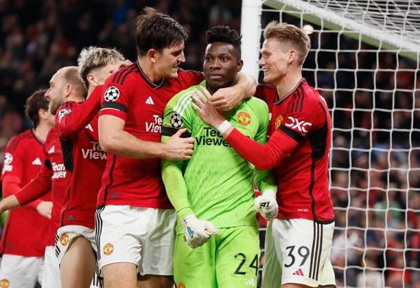 Manchester United, ManU v F.C. Copenhagen: Group A - UEFA Champions League 2023 24 Harry Maguire and Scott McTominay of Manchester United and Andre Onana celebrates last minute save during the UEFA Champions League match between Manchester United and F.C. Copenhagen at Old Trafford on October 24, 2023 in Manchester, England. Manchester Old Trafford England United Kingdom Copyright: xRichardxSellers Sportsphoto APLx 13958456