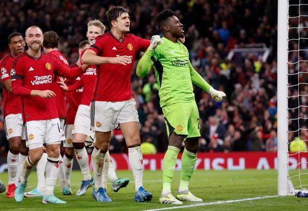 Manchester United, ManU v F.C. Copenhagen: Group A - UEFA Champions League 2023 24 Harry Maguire and Christian Eriksen of Manchester United celebrate with Andre Onana after his last minute penalty save during the UEFA Champions League match between Manchester United and F.C. Copenhagen at Old Trafford on October 24, 2023 in Manchester, England. Manchester Old Trafford England United Kingdom Copyright: xRichardxSellers Sportsphoto APLx 13958462