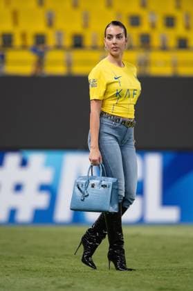 AFC Champions League 2023-24 MD3 Georgina Rodriguez walks on the pitch wearing Guess jeans and Le Silla boots, after the Al-Nassr FC (KSA) vs Al Duhail SC (QAT) Match Day 3 of the AFC Champions League 2023-24 Group E at Al Awwal Park on October 24, 2023 in Riyadh, Saudi Arabia. Al-Nassr FC defeated Al Duhail SC by 4-3 with Cristiano Ronaldo scoring two goals. Riyadh Al Awwal Park Saudi Arabia  Copyright: xVictorxFrailex 2023.10.24_PSI03253.GS.MD3_VFR_9855