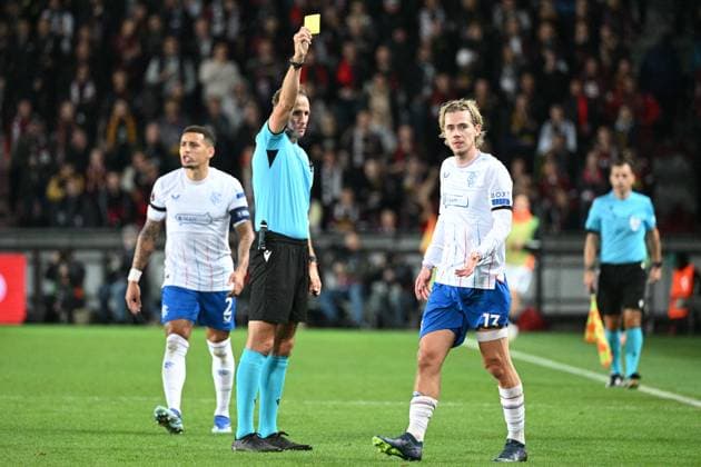 Todd Cantwell of Rangers (right) receives yellow card from referee Todd Cantwell during the Sparta Praha vs Glasgow Rangers, third round match of football European League, Group C in Prague, Czech Republic, October 26, 2023. (CTKxPhoto MichalxKamaryt) CTKPhotoP2023102608140  CTKPhotoP2023102608140