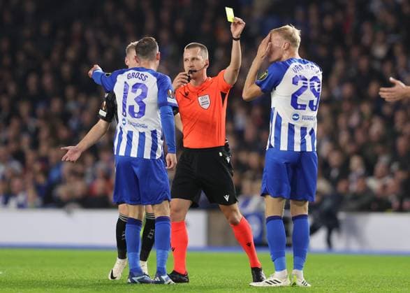Brighton and Hove, England, 26th October 2023. Jan Paul van Hecke of Brighton and Hove Albion is shown a yellow card during the UEFA Europa League match at the AMEX Stadium, Brighton and Hove. Picture credit should read: Paul Terry Sportimage EDITORIAL USE ONLY. No use with unauthorised audio, video, data, fixture lists, club league logos or live services. Online in-match use limited to 120 images, no video emulation. No use in betting, games or single club league player publications. SPI-2677-0024