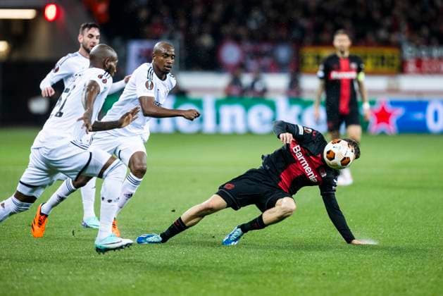 Leverkusen, Bayarena, 26.10.23: Florian Wirtz of Leverkusen (R) challenges Julio Romao of Qarabag during the Europa League match Bayer 04 Leverkusen vs. Qarabag Agdam.