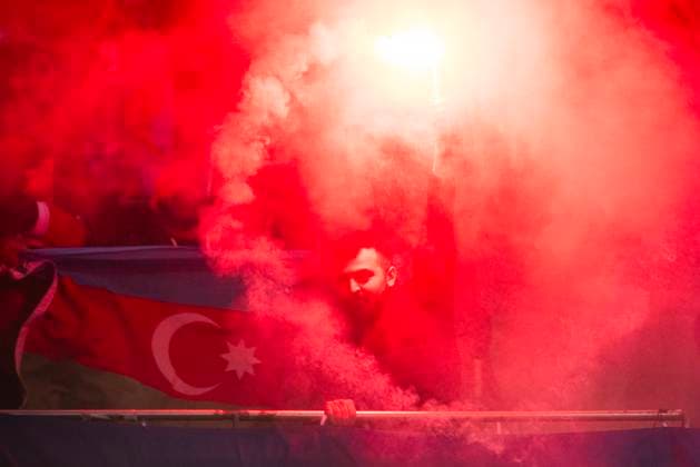 Leverkusen, Bayarena, 26.10.23: Qarabag Fans with some bengal fire during the Europa League match Bayer 04 Leverkusen vs. Qarabag Agdam.