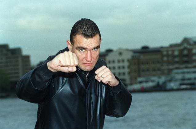 VINNIE JONES British Footballer and Film Star (Wimbledon FC and Wales International Footballer) Announcing his new role as Minder to WWF wrestler Stonecold Steve Austin. COMPULSORY CREDIT: UPPA Photoshot Photo UGL 015584 B-25 18.11.1998 VINNIE JONES British Footballer and Film Star (Wimbledon FC and Wales International Footballer) Announcing his new role as Minder to WWF wrestler Stonecold Steve Austin. COMPULSORY CREDIT: Talking Photoshot Photo UGL 015584 B-25 18.11.1998, Credit:Photoshot Avalon United Kingdom  Copyright: xPhotoshotx xAvalonx 0504330360
