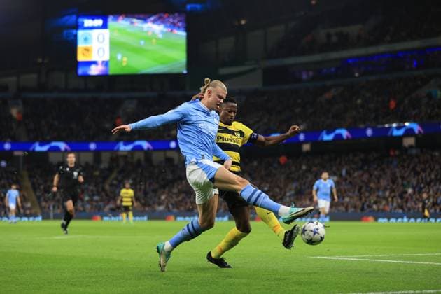 Football - UEFA Champions League - Group G - Manchester City v BSC Young Boys 7th November 2023 - UEFA Champions League - Group G - Manchester City v BSC Young Boys - Erling Haaland of Manchester City and Mohamed Ali Camara of Young Boys - Photo: Simon Stacpoole Offside. Manchester UK Copyright: xSimonxStacpoolexOffside