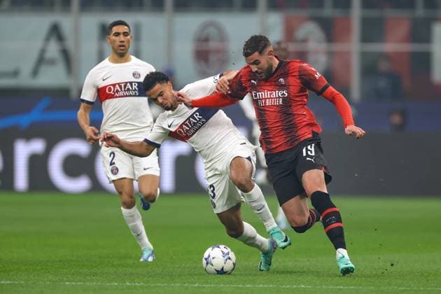 Milan, Italy, 7th November 2023. Warren Zaire-Emery of PSG challenges Theo Hernandez of AC Milan during the UEFA Champions League match at Giuseppe Meazza, Milan. Picture credit should read: Jonathan Moscrop Sportimage EDITORIAL USE ONLY. No use with unauthorised audio, video, data, fixture lists, club league logos or live services. Online in-match use limited to 120 images, no video emulation. No use in betting, games or single club league player publications. SPI-2699-0014