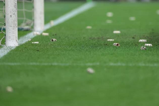 Milan, Italy, 7th November 2023. Fake bank notes thrown by AC Milan fans bearing the image of former goalkeeper Gianluigi Donnarumma of PSG litter the area around the goal during the UEFA Champions League match at Giuseppe Meazza, Milan. Picture credit should read: Jonathan Moscrop Sportimage EDITORIAL USE ONLY. No use with unauthorised audio, video, data, fixture lists, club league logos or live services. Online in-match use limited to 120 images, no video emulation. No use in betting, games or single club league player publications. SPI-2699-0055