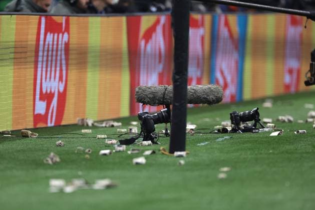Milan, Italy, 7th November 2023. Fake bank notes thrown by AC Milan fans bearing the image of former goalkeeper Gianluigi Donnarumma of PSG litter the area around the goal during the UEFA Champions League match at Giuseppe Meazza, Milan. Picture credit should read: Jonathan Moscrop Sportimage EDITORIAL USE ONLY. No use with unauthorised audio, video, data, fixture lists, club league logos or live services. Online in-match use limited to 120 images, no video emulation. No use in betting, games or single club league player publications. SPI-2699-0056