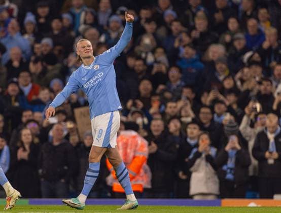 (231108) -- MANCHESTER, Nov. 8, 2023 -- Manchester City s Erling Haaland celebrates after scoring during the UEFA Champions League Group G match between Manchester City FC and BSC Young Boys in Manchester, Britain, on Nov. 7, 2023. (SP)BRITAIN-MANCHESTER-FOOTBALL-UEFA CHAMPIONS LEAGUE-MANCHESTER CITY VS BSC YOUNG BOYS XinxHua 