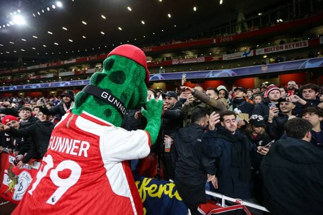 Arsenal v Sevilla 8 November 2023, London - Champion™s League Football, Group B - Arsenal v Sevilla - Gunnersaurus greets Arsenal fans - Photo: Jacques Feeney Offside. London UK Copyright: xJacquesxFeeneyx xOffsidexOffside