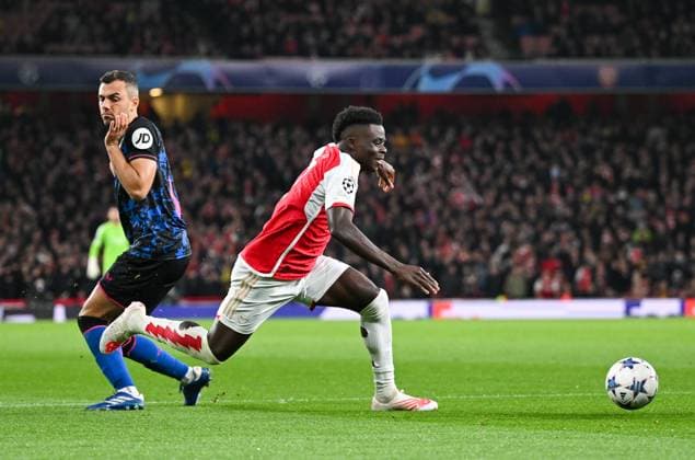 Arsenal v Sevilla UEFA Champions League Bukayo Saka of Arsenal goes down in the area during the UEFA Champions League Group B match at the Emirates Stadium, London Copyright: xNigelxBramleyx FIL-19220-0030 UK Newspapers OUT