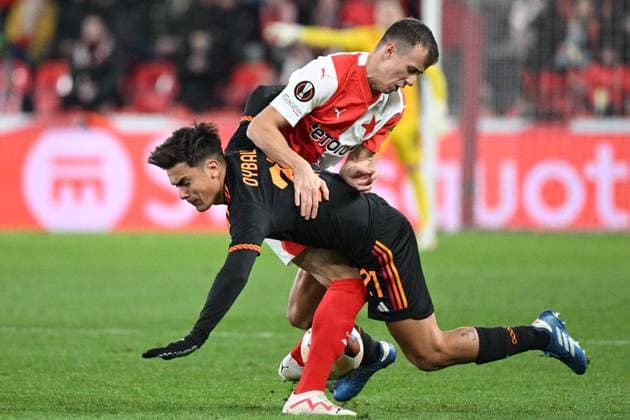 From left Paulo Dybala of AS Rome and Petr Sevcik of Slavia in action during the football Europe League 4th round match Slavia Praha vs AS Rome, group G in Prague, Czech Republic, November 9, 2023. (CTKxPhoto MichalxKamaryt) CTKPhotoP2023110909194  CTKPhotoP2023110909194