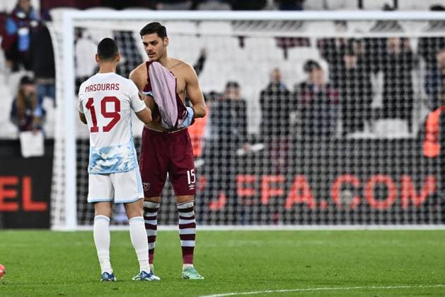 LONDON, ENGLAND - NOVEMBER 9: Georgios Masouras of Olympiacos FC and Konstantinos Mavropanosi of West Ham United during the UEFA Europa League match between West Ham United FC and Olympiacos FC at London Stadium on November 9, 2023 in London, England. Photo by Sebastian Frej West Ham United FC v Olympiacos FC: Group A - UEFA Europa League 2023 24 Copyright: xSebastianxFrejx
