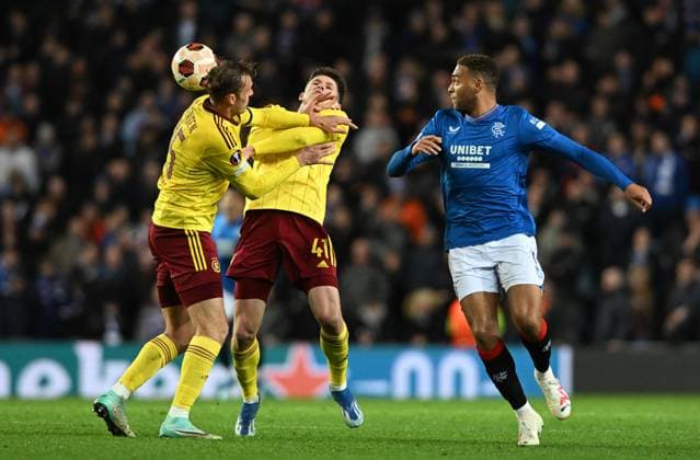 Glasgow, Scotland, 9th November 2023. Asger S¿rensen and Martin Vit’k of Sparta Prague and Cyriel Dessers of Rangers during the UEFA Europa League match at Ibrox Stadium, Glasgow. Picture credit should read: Neil Hanna Sportimage EDITORIAL USE ONLY. No use with unauthorised audio, video, data, fixture lists, club league logos or live services. Online in-match use limited to 120 images, no video emulation. No use in betting, games or single club league player publications. SPI-2721-0068