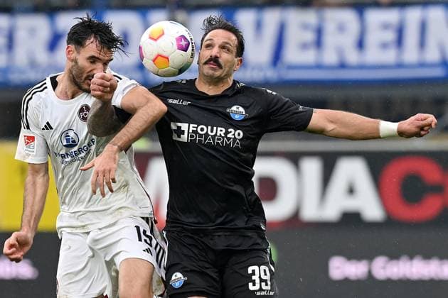 Paderborn, Home Deluxe Arena, 11.11.23, GER, Herren, 2.Bundesliga, Saison 2023-2024, SC Paderborn 07 - 1.FC Nuernberg Bild: v.li. im Zweikampf Ivan MARQUEZ (Nuernberg) und Adriano GRIMALDI (Paderborn) Only for editorial use! DFL regulations prohibit any use of photographs as image sequences and or quasi-video. NRW Deutschland