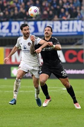 Paderborn, Home Deluxe Arena, 11.11.23, GER, Herren, 2.Bundesliga, Saison 2023-2024, SC Paderborn 07 - 1.FC Nuernberg Bild: v.li. im Zweikampf Ivan MARQUEZ (Nuernberg) und Adriano GRIMALDI (Paderborn) Only for editorial use! DFL regulations prohibit any use of photographs as image sequences and or quasi-video. NRW Deutschland