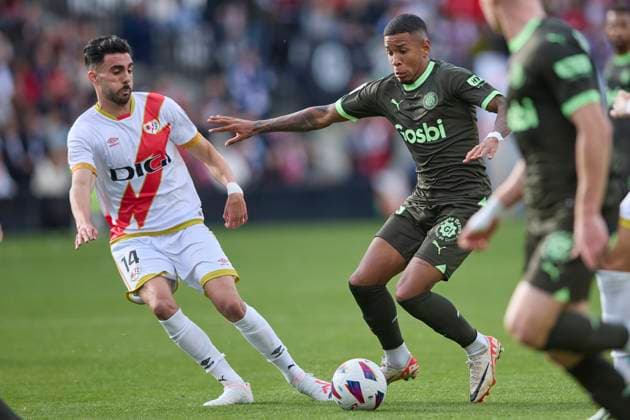 Spain, Madrid, 11.11.2023, Santiago Bernabeu Stadium, Real Madrid v Valencia CF - La Liga EA Sports match round 13, Savio Moreira (Girona FC) and Kike Perez (Rayo Vallecano) battle for the ball Madrid Santiago Bernabeu Stadium Spain