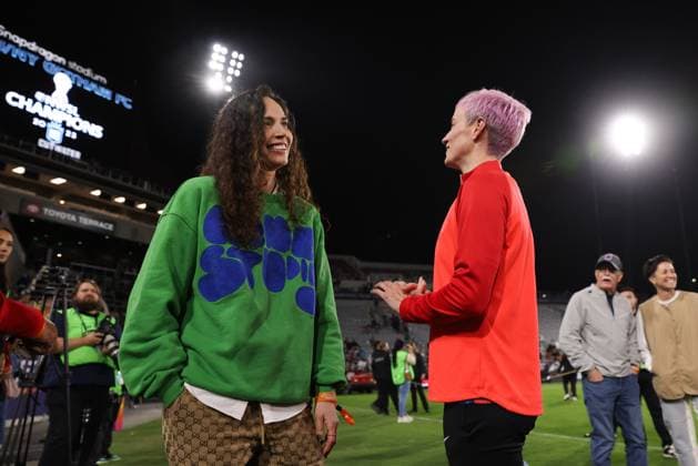 November 11, 2023, San Diego, California, USA: OL Reign forward MEGAN RAPINOE (15) and her partner SUE BIRD talk after a NWSL championship match between OL Reign and NJ NY Gotham FC at Snapdragon Stadium in San Diego, California. San Diego USA - ZUMAt158 20231111_zsp_t158_071 Copyright: xBrentonxTsex