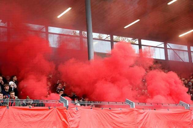 12.11.2023, xavx, Fussball 2.Bundesliga, SV Wehen Wiesbaden - 1.FC Kaiserslautern emspor, v.l. Zuschauer, Fans, Fahnen, Ultras, Schals, Choreo, Choreografie der Fans vom SV Wehen Wiesbaden, Pyro, Pyrotechnik, Nebeltoepfe, roter Nebel (DFL DFB REGULATIONS PROHIBIT ANY USE OF PHOTOGRAPHS as IMAGE SEQUENCES and or QUASI-VIDEO) Wiesbaden