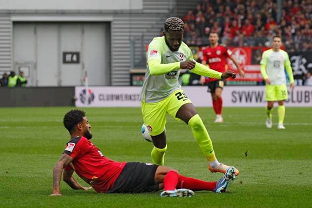 12.11.2023, xavx, Fussball 2.Bundesliga, SV Wehen Wiesbaden - 1.FC Kaiserslautern emspor, v.l. Martin Angha (SV Wehen Wiesbaden), Richmond Tachie (1.FC Kaiserslautern) (DFL DFB REGULATIONS PROHIBIT ANY USE OF PHOTOGRAPHS as IMAGE SEQUENCES and or QUASI-VIDEO) Wiesbaden