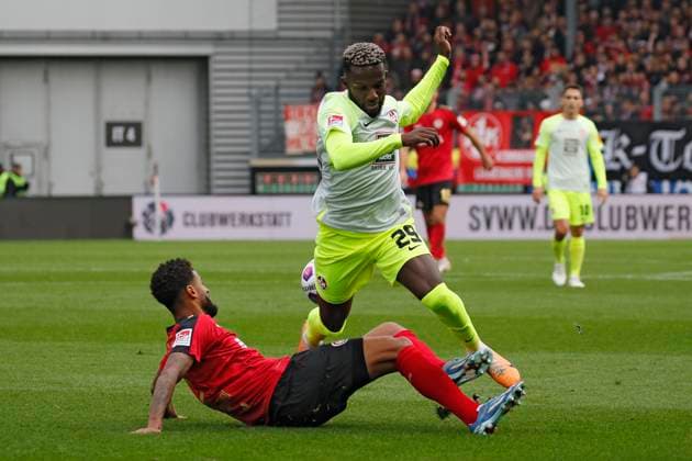 12.11.2023, xavx, Fussball 2.Bundesliga, SV Wehen Wiesbaden - 1.FC Kaiserslautern emspor, v.l. Martin Angha (SV Wehen Wiesbaden), Richmond Tachie (1.FC Kaiserslautern) (DFL DFB REGULATIONS PROHIBIT ANY USE OF PHOTOGRAPHS as IMAGE SEQUENCES and or QUASI-VIDEO) Wiesbaden