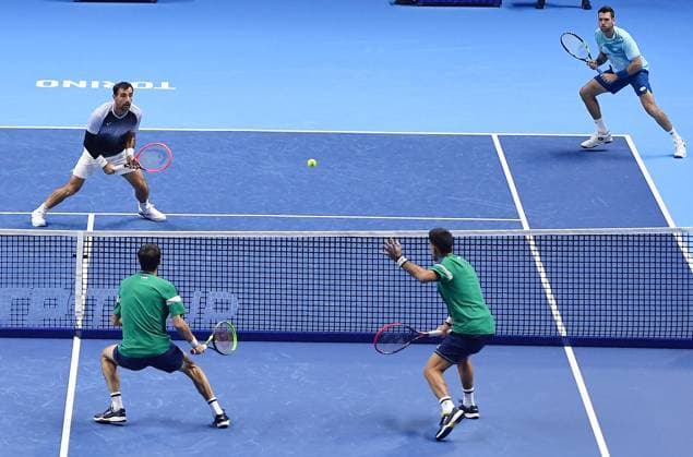 November 12, 2023, Turin: Ivan Dodig of Croatia and Austin Krajicek of USA in action against Massimo Gonzalez of Argentina and AndrÃ s Molteni of Argentina during the Nitto ATP, Tennis Herren Finals 2023 tennis tournament at the Pala Alpitour arena in Turin, Italy, 12 November 2023. ANSA ALESSANDRO DI MARCO Nitto Atp Finals  - ZUMAa110 20231112_zaf_a110_021 Copyright: xAlessandroxDixMarcox